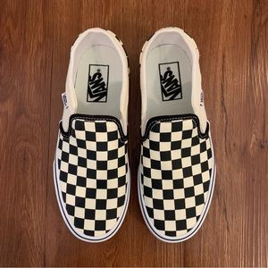 Women’s Vans black/off-white slip-on checkerboard shoes